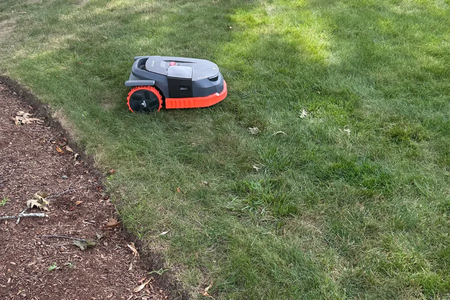 A sleek, robotic lawnmower
